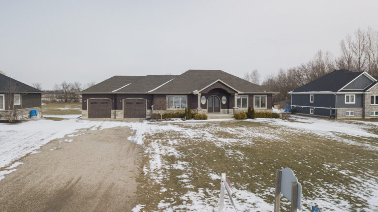Spectacular custom-built home (2018) on a 1.4 acre lot on a beautiful, paved country road.