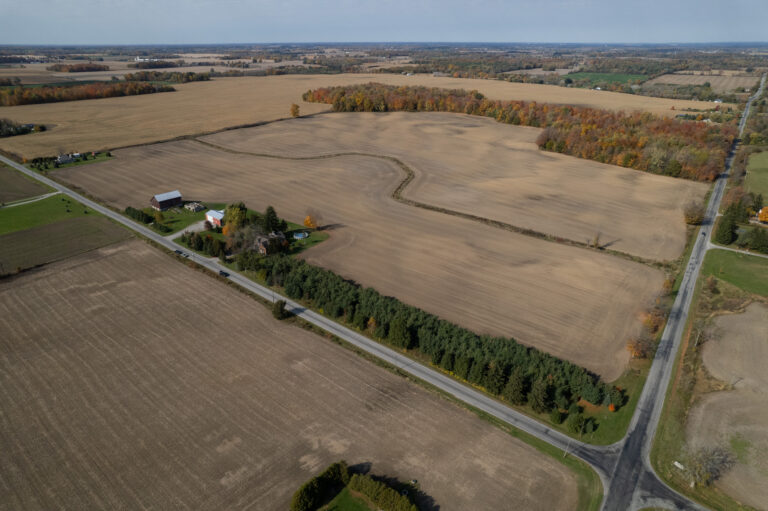 Picturesque 99.14 acre farm fronting on two paved country roads in Norfolk County.
