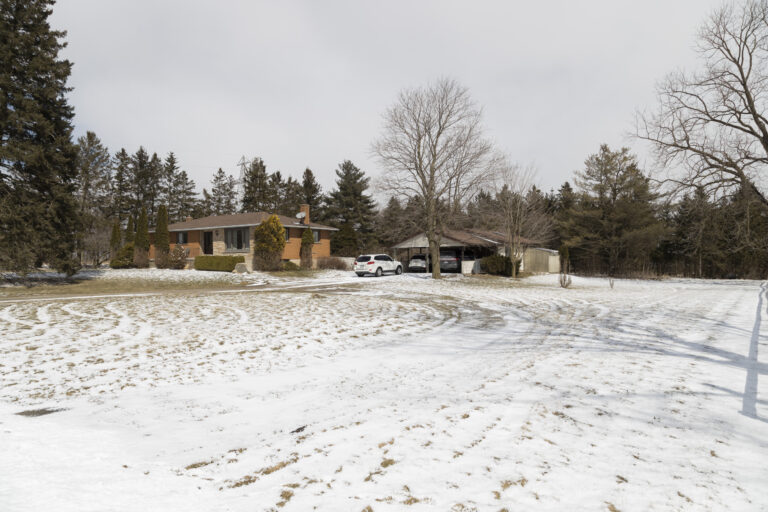 Wonderful all brick bungalow with detached garage/workshop on a 1.62 acre corner lot just off Hwy 403/Rest Acres Road and surrounded by brand new development and the Grand River.