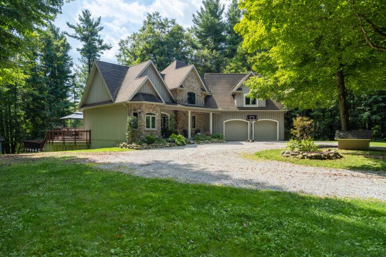 Spectacular 2.45 acre “Muskoka-esque” property with full walk out basement on a beautiful, paved country road in Norfolk County.