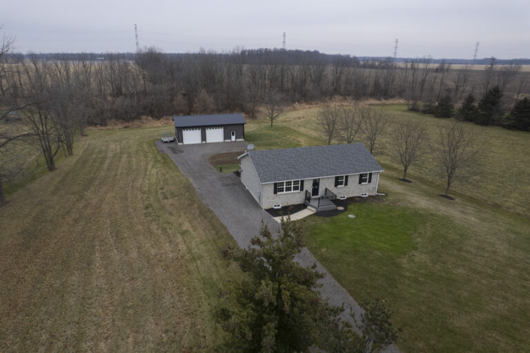 Absolutely stunning, all brick bungalow with a fully finished basement and the amazing 24’ x 44’ detached & heated workshop, on a 0.57 acre country lot.