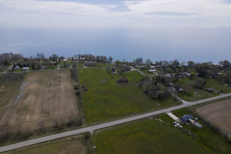 Rare (approx.) 6.5 acre hobby farm next to the Vaughn survey and steps to the water with spectacular Lake Erie views from the top floor of the century home and barn.