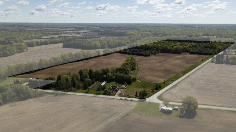 Picture-perfect 50+ acre farm on two paved roads in rural Norfolk.
