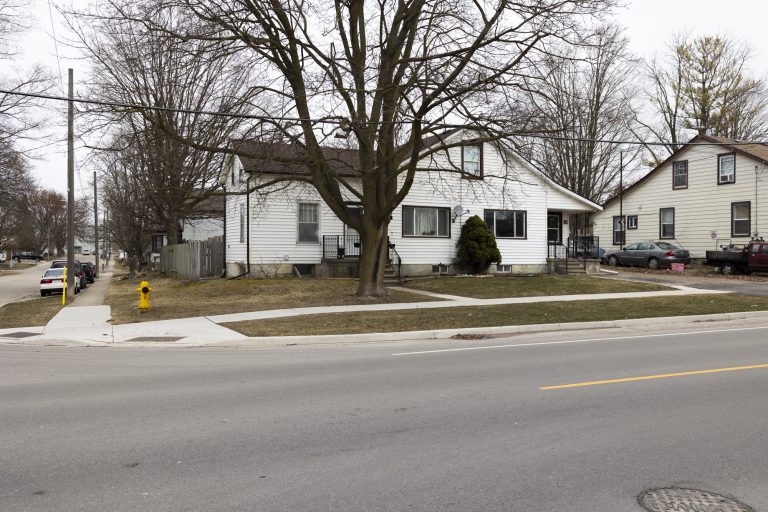 Calling all investors or first-time home buyers! Rare offering of two semi-detached units under one ownership with an additional in-law suite for three total dwellings.