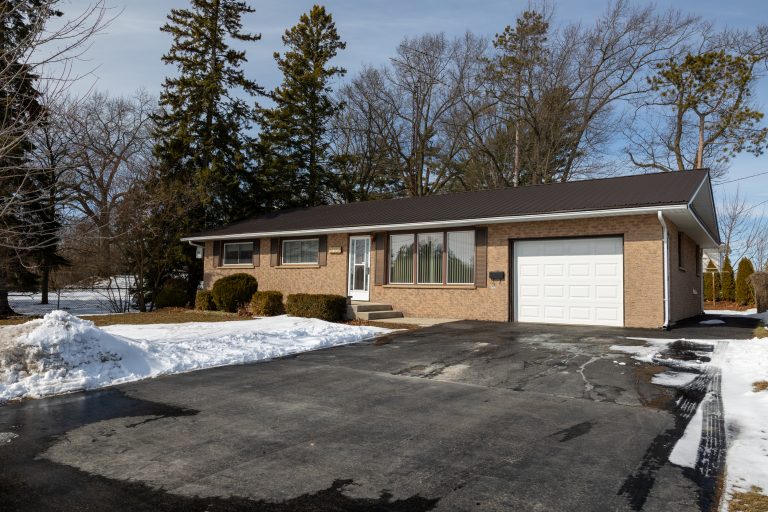 Lovingly cared for 3+1-bedroom, 2.5 bath, all brick bungalow, with full, partially finished basement in Delhi.