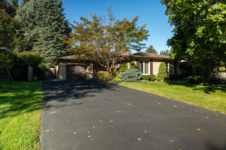 Immaculate move-in-ready back split with kidney shaped inground swimming pool and walk-up basement, in a quiet, family friendly neighbourhood.