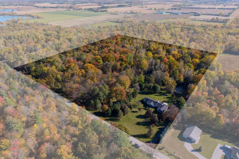 Fantastic custom built, sprawling ranch home with an oversized double car attached garage on a 27.1 acre (mostly) wooded lot with a ravine and ponds!